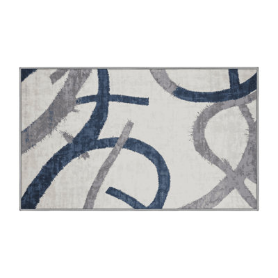 Tapis gris lavable à la machine