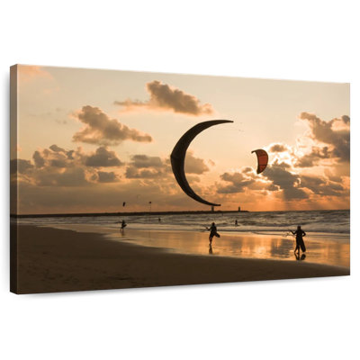 Kites surf au coucher du soleil