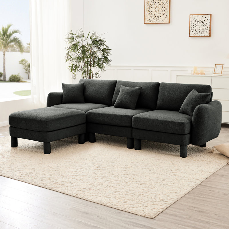 Canapé 3 places en tissu bouclé gris foncé avec un design en forme de L, des pieds distinctifs, amovibles et cylindriques, une forme de canapé modulaire confortable pour la sieste, une vie en coquillage idéale