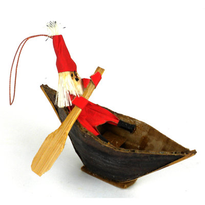 Ornement figurine suspendu père noël dans un bateau