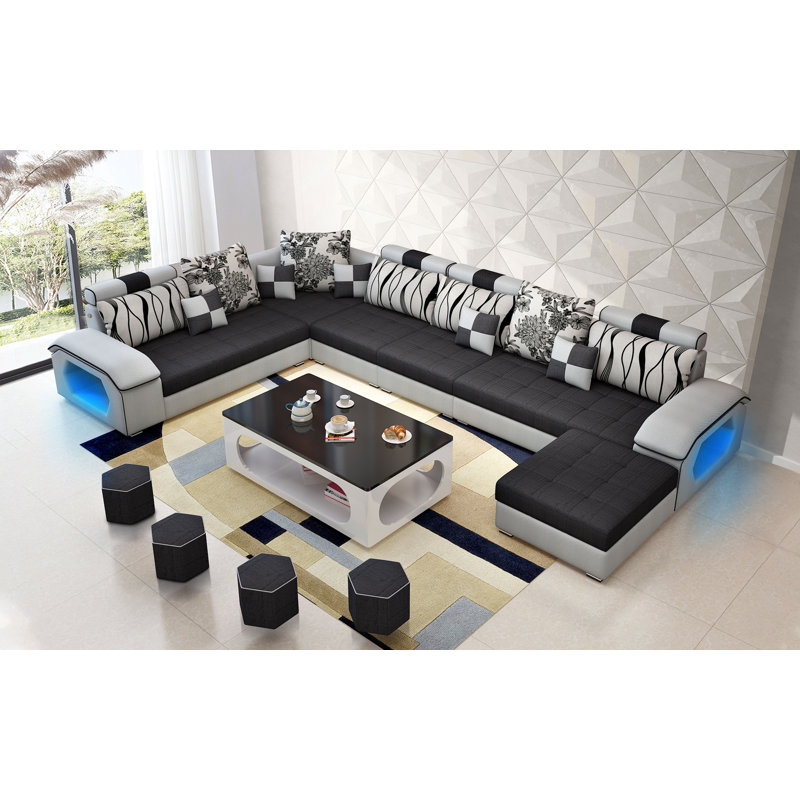 Canapé modulaire réversible en microfibre avec repose-pieds Marialys