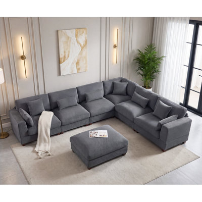 Canapé modulaire en L 7 pièces avec repose-pieds de 136 po de largeur 136 po