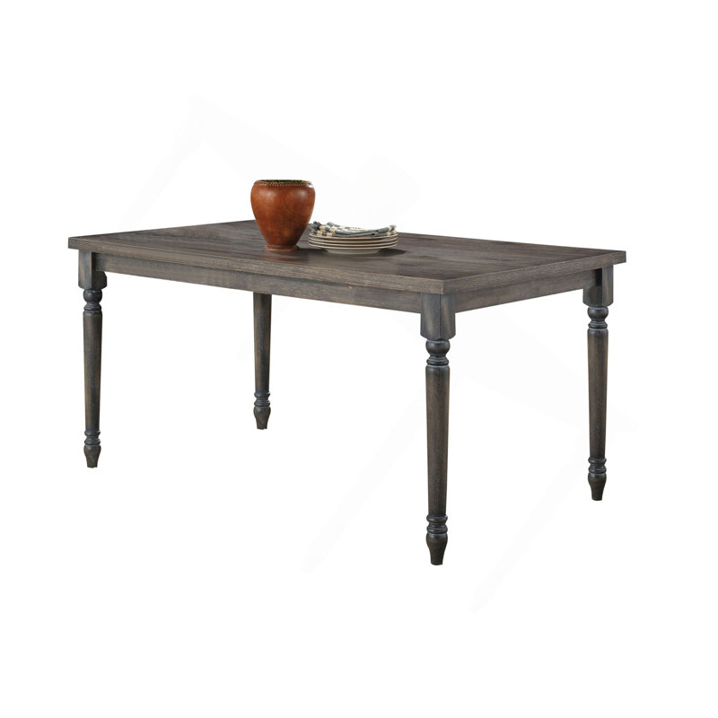Table de salle à manger patinée avec pattes tournées