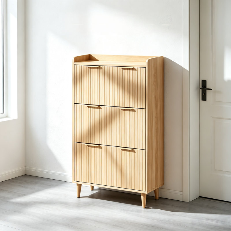Armoire à chaussures 3 tiroirs avec grille supérieure, panneaux de porte en panneau de fibres à densité moyenne thermoformés, coutures et poignées de porte dorées champagne, pieds en bois massif conique