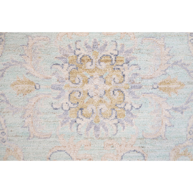 Tapis bleu clair et ivoire noué à la main de haute qualité