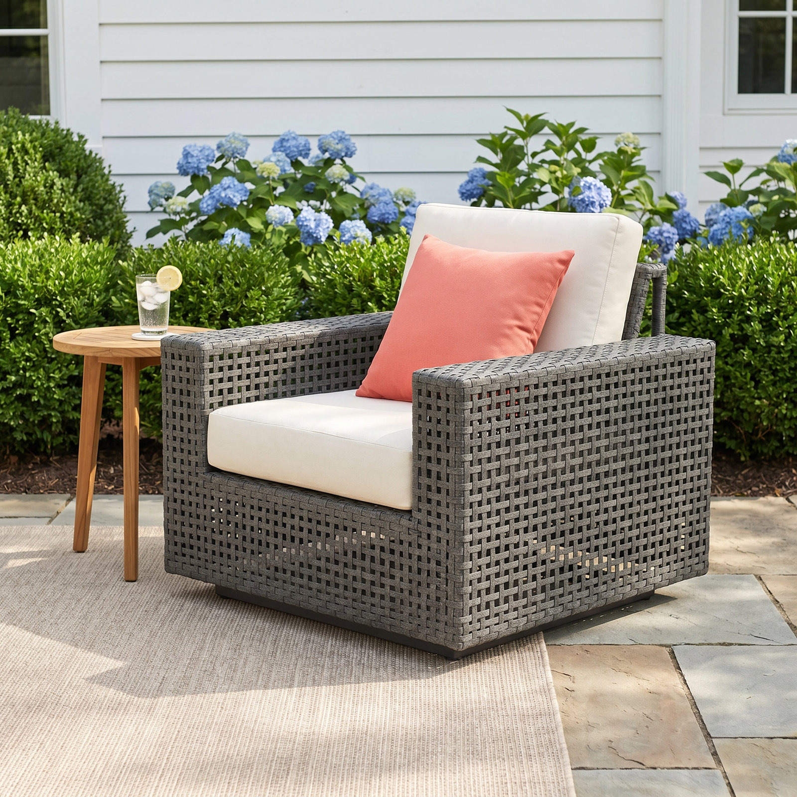Jenette Wicker Outdoor Lounge Chair with Sunbrella Cushions
