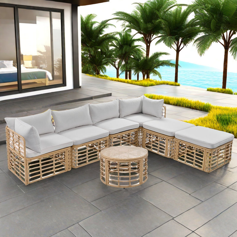 Ensemble de canapé modulaire en rotin pour l'extérieur 7 pièces avec six sièges individuels et une table basse ronde et des oreillers