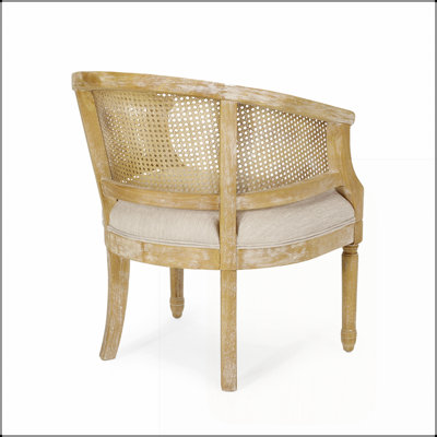 Fauteuil d'appoint avec structure en caoutchouc, revêtement beige et dossier incurvé pour une assise confortable et un style rétro