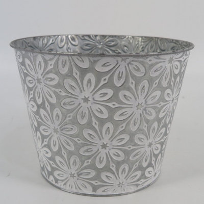 White Washed Flowers On Metal Planter