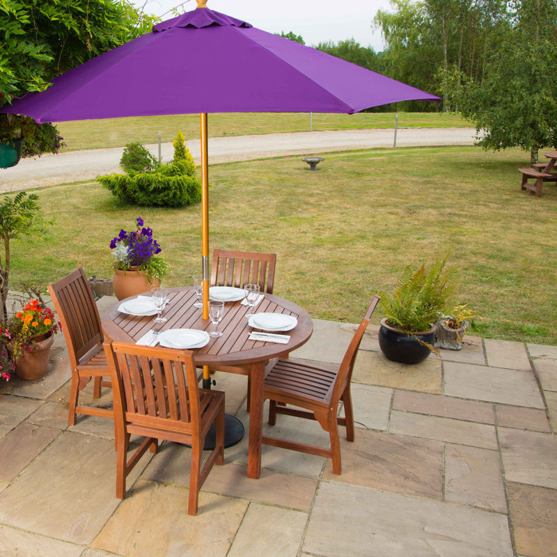 Devon 4 - Person Wood Patio Dining Set with Round Table