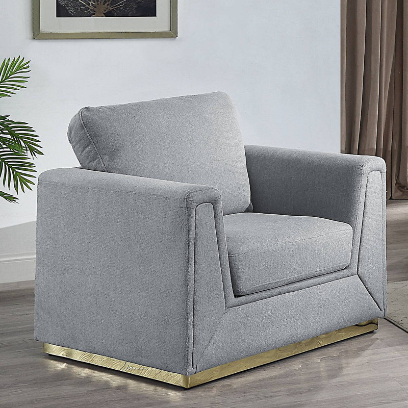 Chaise d'appoint grise avec coussin