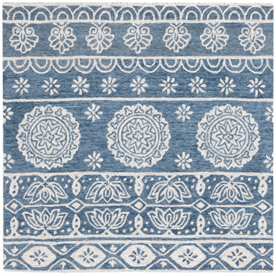 Leavens Hand Tufted Wool/Cotton Floral Rug in Blue/Ivory