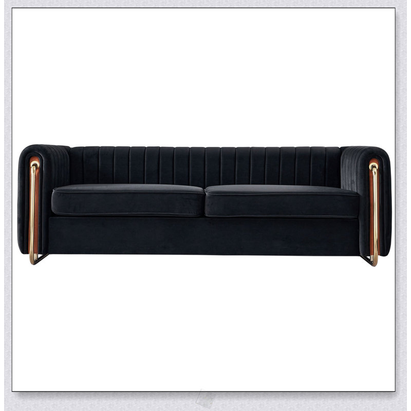 Canapé moderne en velours avec dossier capitonné et structure durable, pour plus de confort et de style dans tout espace de vie.