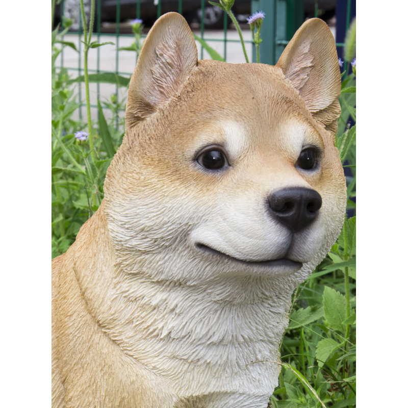 Statue Shiba Inu assise