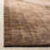Tibetan Plum Pictogram Brown Area Rug