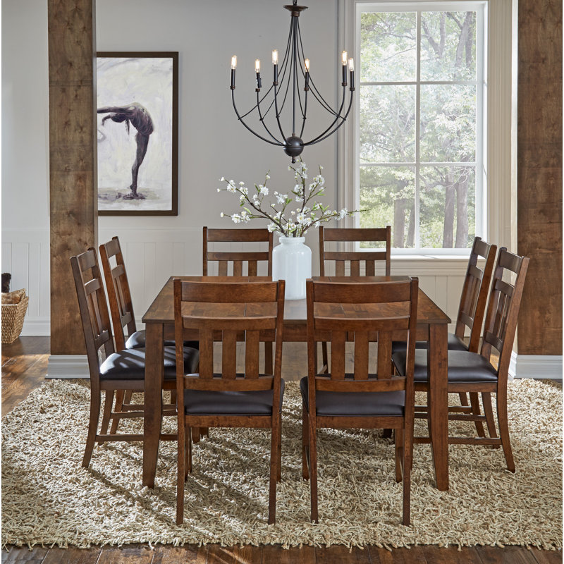 Osya 9-Piece Extendable Faux Leather Dining Set