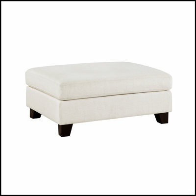 Coussin de repose-pieds rembourré en tissu ivoire avec pieds en bois massif pour les salons modernes
