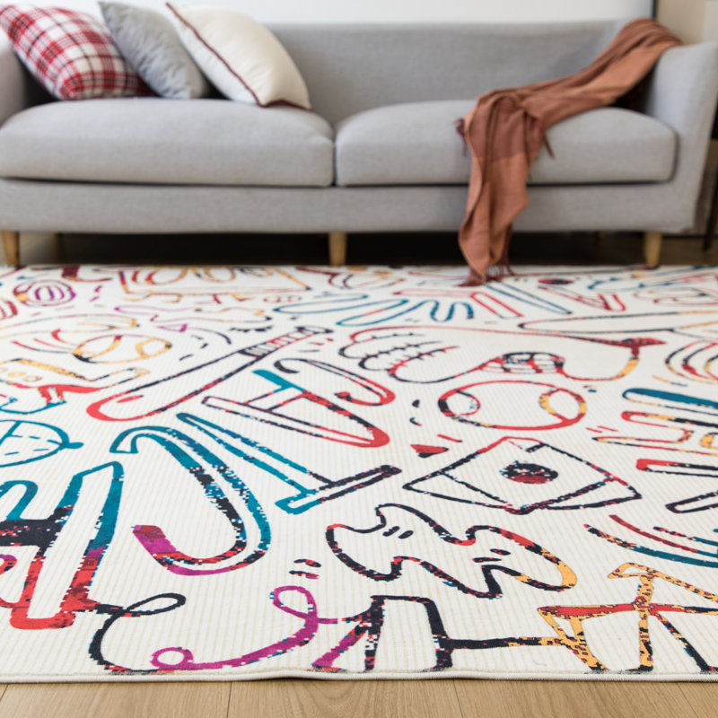 Tapis ivoire Sportsglyphs II par Katie Merz, Rectangulaire : 7 pi 9 po x 9 pi 9 po