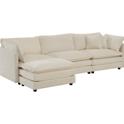 Canapé modulaire rembourré en chenille beige avec éponge et construction pour un confort relaxant