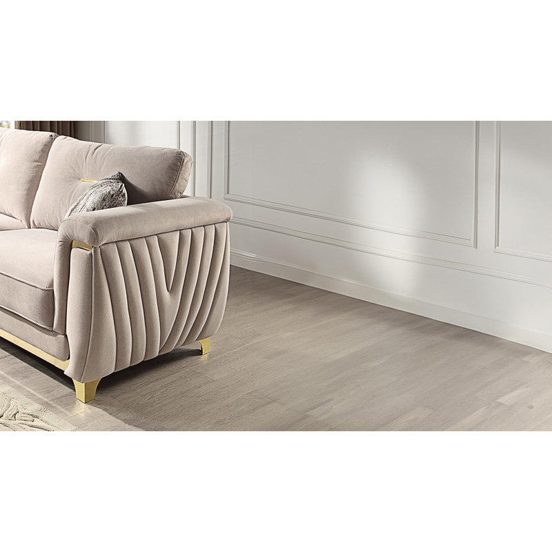 Canapé rembourré de style contemporain avec détails dorés, Beige