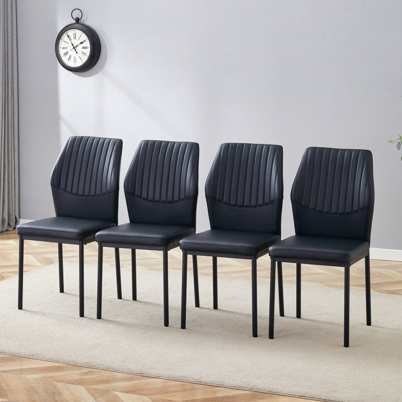 Chaise de luxe simple - ensemble de 4 chaises de salle à manger en polyuréthane noir à haute résilience avec pieds en métal noir. Le dossier de la chaise possède un motif à rayures verticales avec des lignes lisses et uniformes. W1151P282693