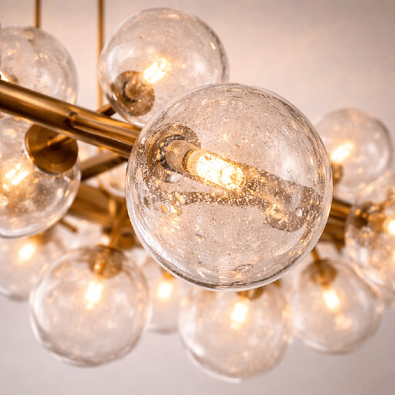 Orbit 29-Globe Aged Brass Linear Chandelier
