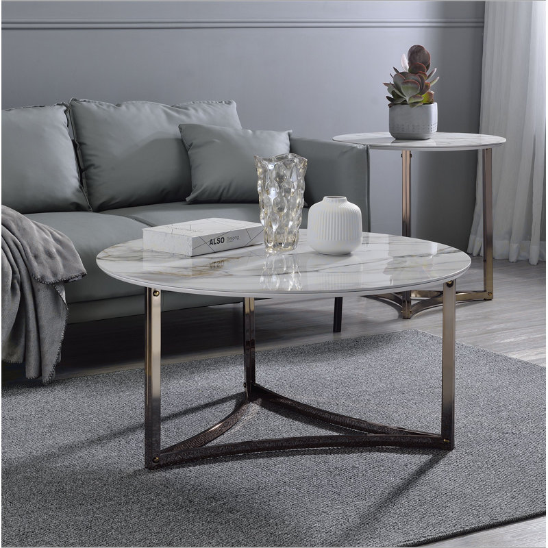 Table basse Aziz avec plateau en pierre frittée et finition champagne