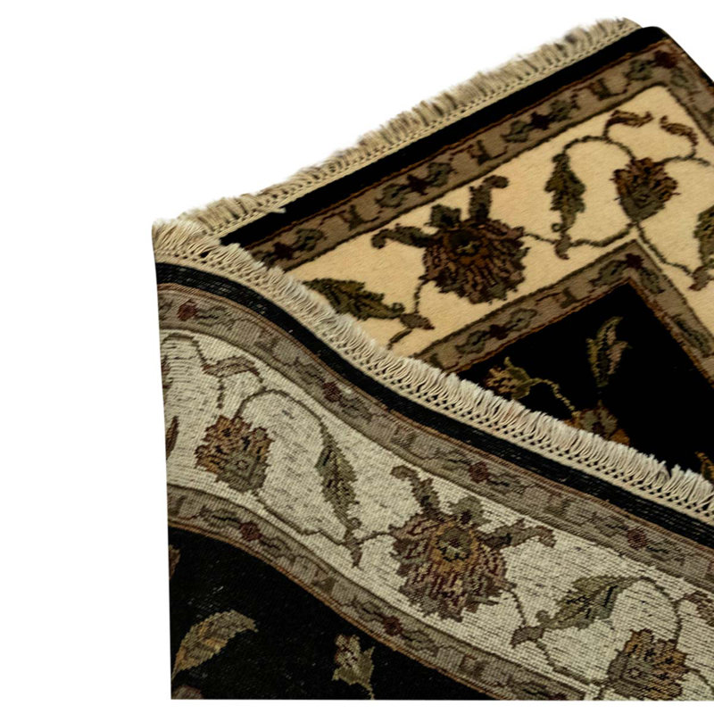 Tapis noir / ivoire de haute qualité noué à la main