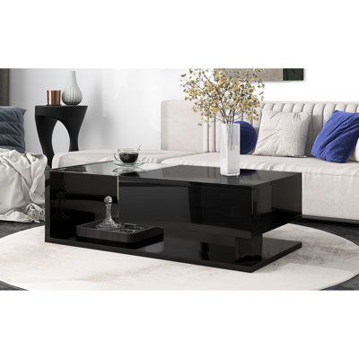 Table basse rectangulaire noire avec tiroir