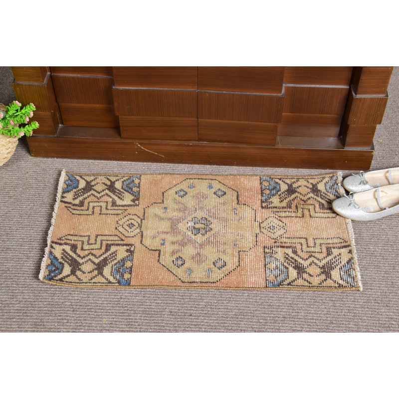 Tapis turc rétro noué à la main en laine naturelle avec des motifs géométriques et des tons bruns et bleus