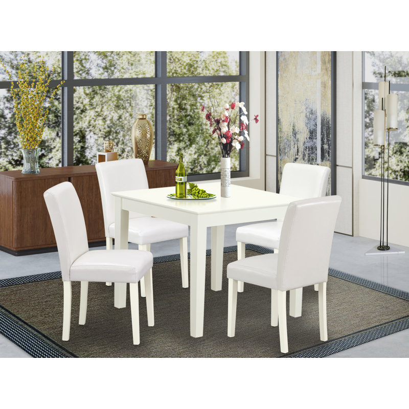 5 Piece Dining Room Table Set Includes a Square Wooden Table and 4 White Faux Leather Upholstered Parson Chairs, Linen White