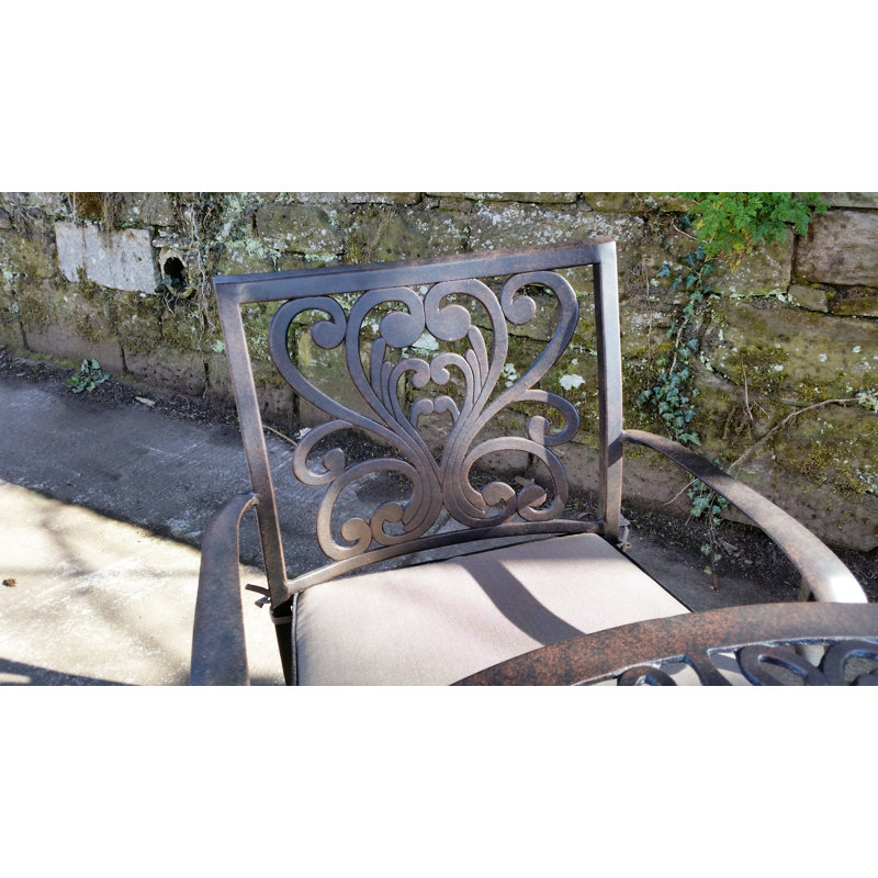 Pathard 4 - Person Patio Dining Set with Round Table , Cushions Included