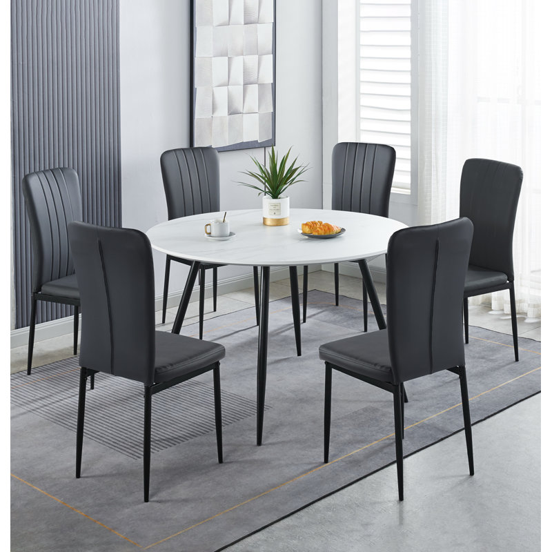 Cullompton Large Round Dining Table 120Cm, Marble Effect Top, With 6 Black Faux Leather High Back Chairs, White