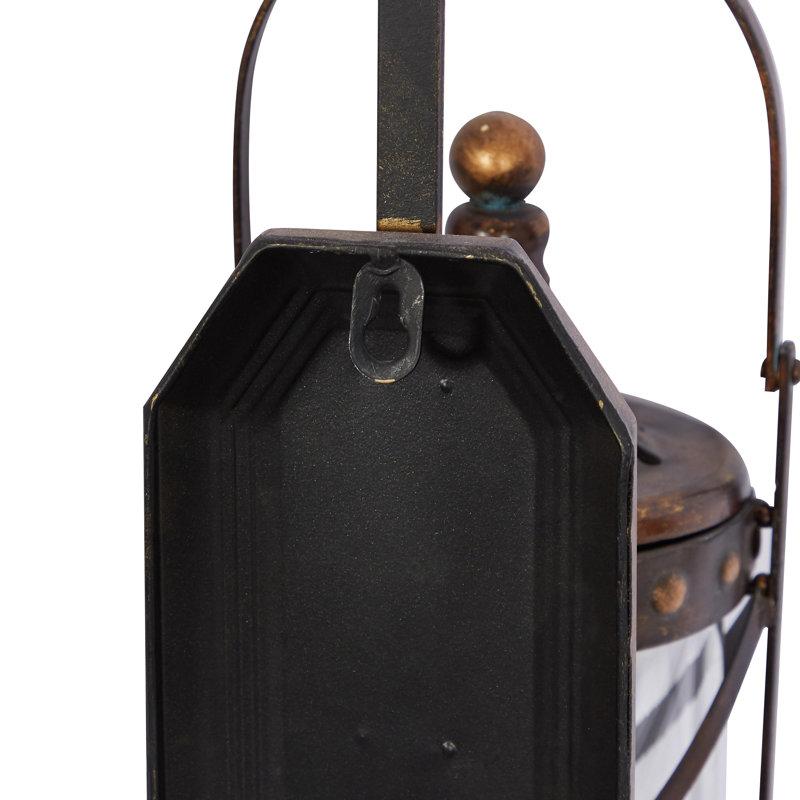 Metal Suspended Studded Fleur De Lis Indoor Outdoor Bronze Wall Sconce with Scroll Details