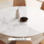 Table de salle à manger ronde moderne avec plateau en pierre brillant-106919807