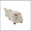 Luxueux canapé en chenille pour le salon avec plusieurs coussins et repose-pieds convertible, pour plus de confort et de style.