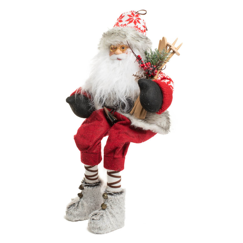 Père Noël alpin assis rouge