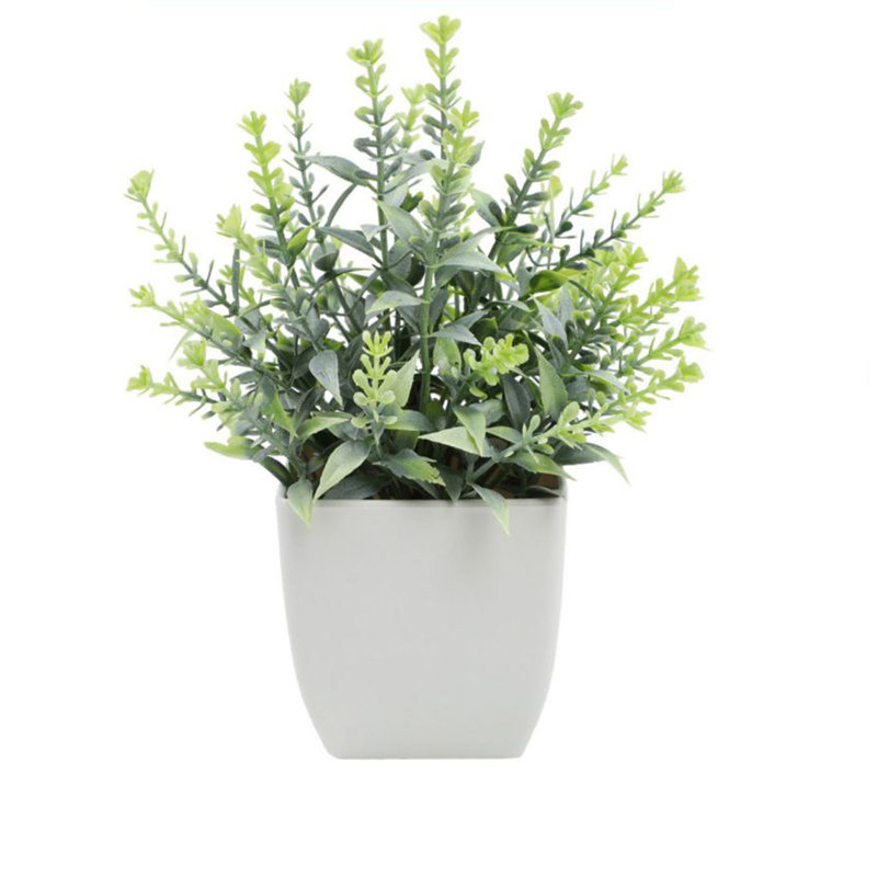 Petites plantes artificielles artificielles en pots pour la maison