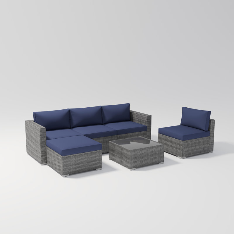 Ensemble de conversation modulaire en rotin 6 pièces avec coussins Eudy, Gris / Bleu marine