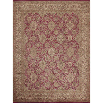 Tapis de format standard de haute qualitÃ©, nouÃ© Ã  la main, dans les tons de baies et d'ivoire