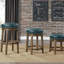 Ensemble de 2 tabourets de bar rotatifs ronds, similicuir vert, siège pivotant à 360 degrés, garniture cloutée, structure en bois massif, finition brune-1165587517
