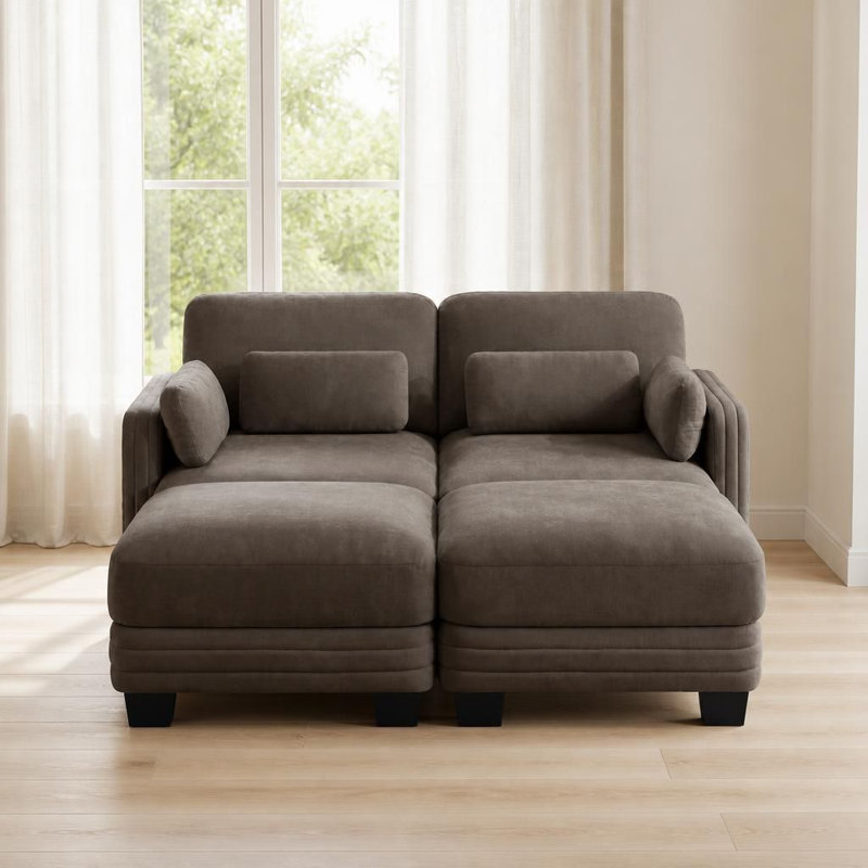 Canapé d'angle modulaire 2 places au design moderne et minimaliste capitonné, avec 2 poufs amovibles. Coussins d'assise épais et résistants. Dossier ergonomique réglable multi-positions. Revêtement en chenille respirante. Parfait pour un salon, un appartement ou un petit espace.