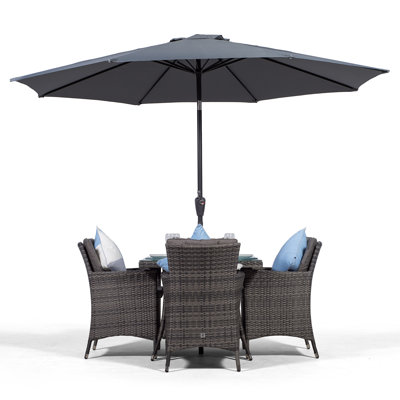 Karcher 4 - Person Square Patio Dining Set with Cushions included