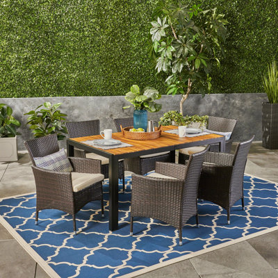 Montero 6 - Person Acacia Wicker Patio Dining Set with Rectangular Table , Cushions Included