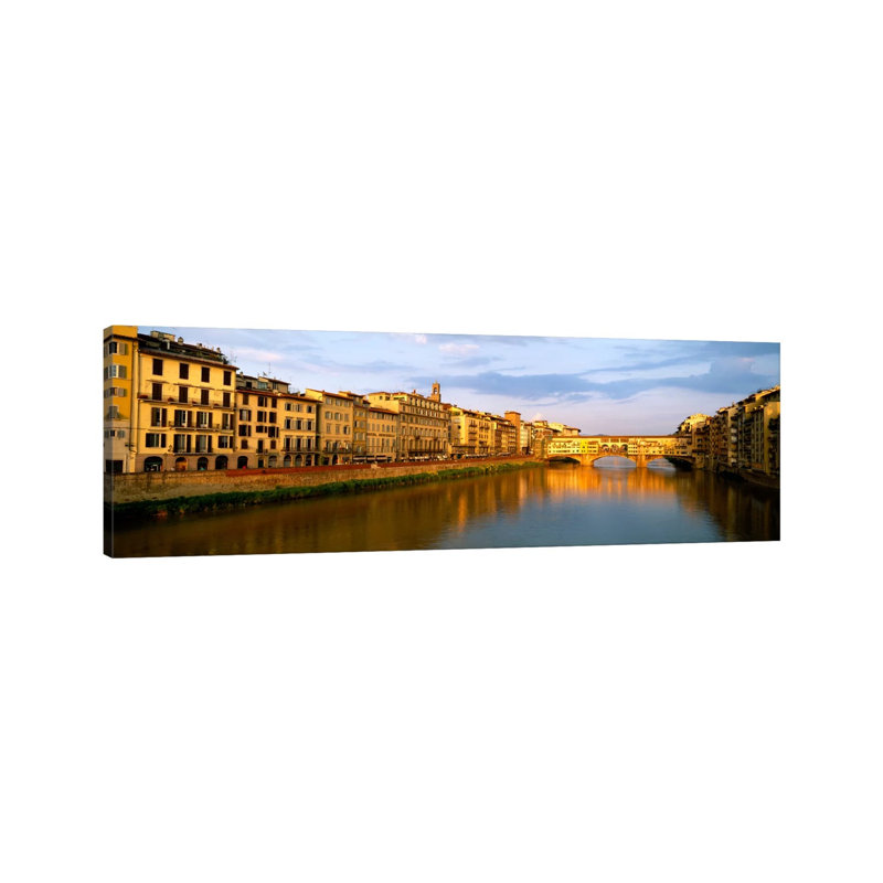 Riverfront Architecture And Ponte Vecchio, Arno River, Florence, Tuscany, Italy by Panoramic Images - Wrapped Canvas Panoramic Print