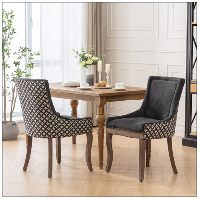 Luxurious Fabric Dining Chair Set With Solid Wood Legs And High Backrest For Ultimate Comfort And Style.