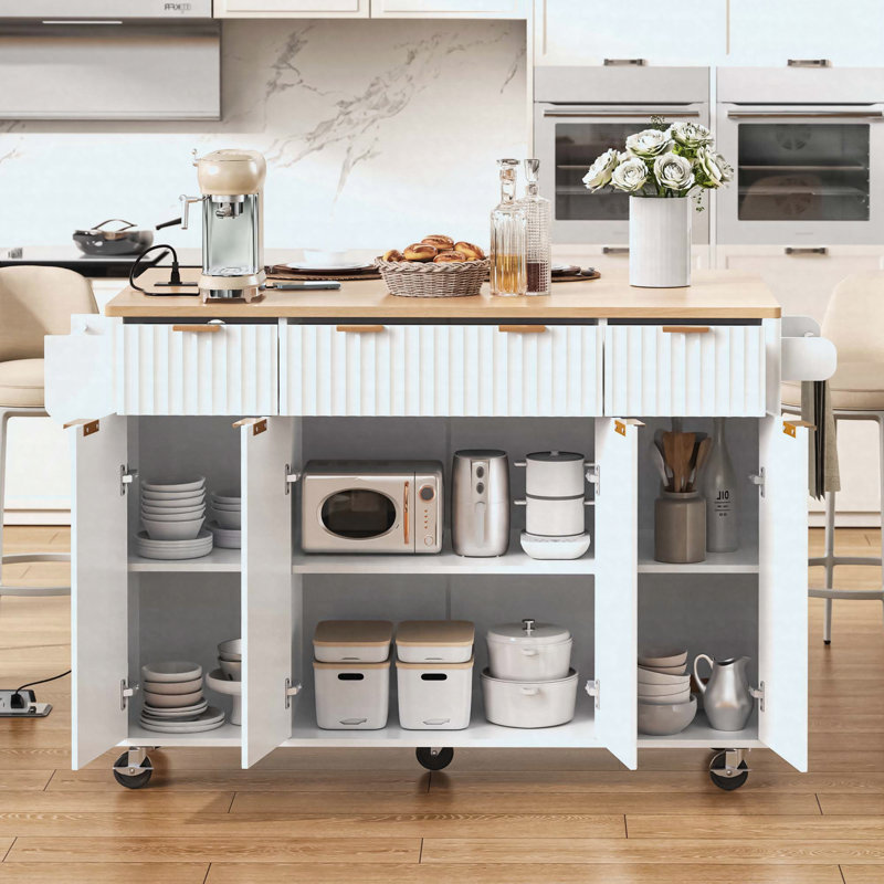 Fluted Kitchen Island with Storage, 55.5" Kitchen Island with Drop Leaf, Power Outlet, 4 Doors and 3 Drawers, Rolling Island Table with Wood-grain Top, Curved Edge for Kitchen,Dining Room White