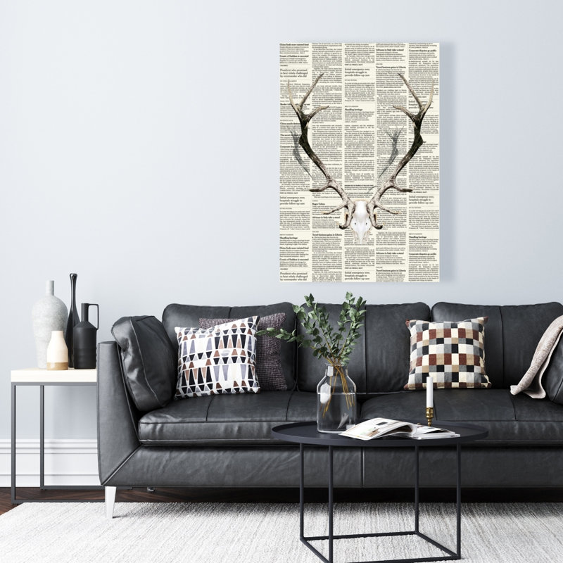 Animaux, toile de cerf brun - cornes de cerf sur papier journal