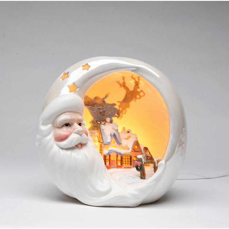 Père Noël avec veilleuse maison de Noël