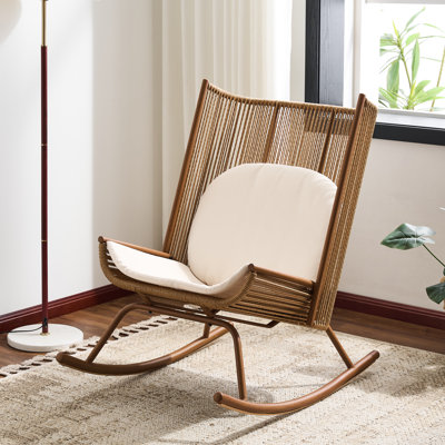 Chaise berçante d'extérieur Rosella Hyrum avec rotin en PE et haut dossier